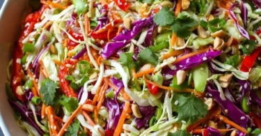 Colorful Asian Chopped Salad with fresh vegetables and dressing