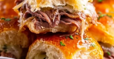Delicious French Dip Sliders with tender beef served with au jus
