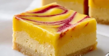 Delicious mango curd bars topped with fresh mango slices