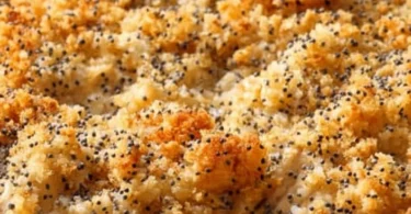 Pioneer Woman's Poppy Seed Chicken Casserole topped with crispy breadcrumbs and poppy seeds