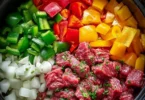 Slow Cooker Honey Garlic Beef served with vegetables in a bowl