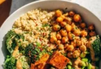 Spicy Roasted Sweet Potato Buddha Bowl with vibrant vegetables and grains