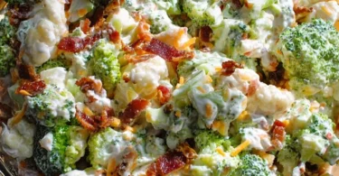 Colorful sweet broccoli cauliflower salad with vibrant vegetables and dressing